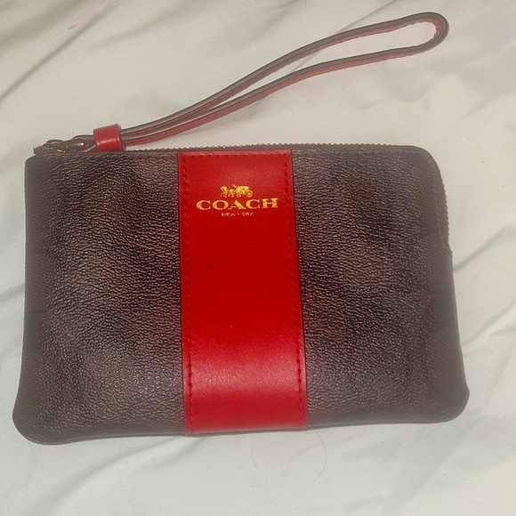 Coach Handbags - Nwot wristlet. Got it and I never used it.